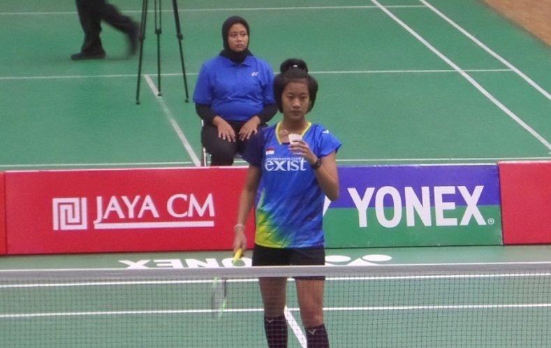 Putri Kusuma Wardani, wakil tunggal PB Exist Jakarta, akhirnya menjadi penentu kemenangan klubnya, usai sukses mengalahkan Saifi Rizka Nurhidayah (PB Mutiara Cardinal Bandung), 21-17, 19-21, 21-17. (Adt/NYSN)